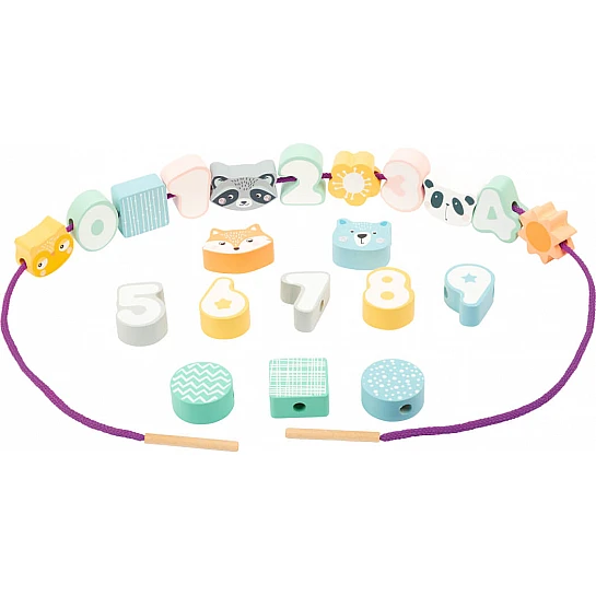 Игрушка-погремушка для завязывания в пастельных тонах